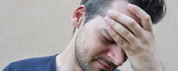 Dolor de cabeza (imagen referencial) - Sputnik Mundo