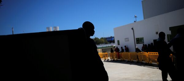 Los migrantes en España - Sputnik Mundo