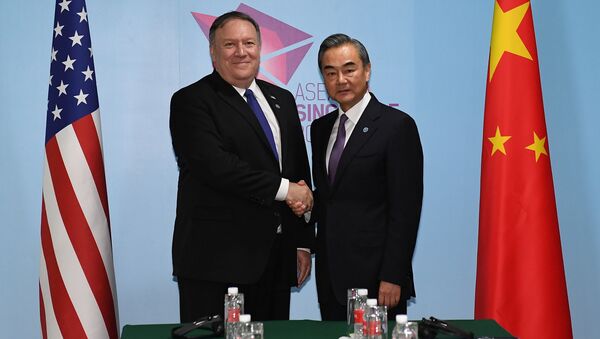 Wang Yi, canciller de China y Mike Pompeo, secretario de Estado de EEUU - Sputnik Mundo