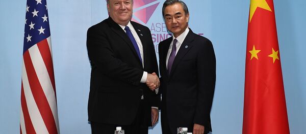 Wang Yi, canciller de China y Mike Pompeo, secretario de Estado de EEUU - Sputnik Mundo