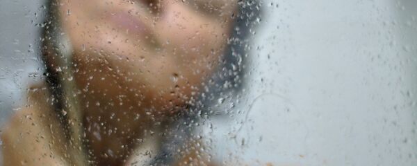 Una mujer en la ducha - Sputnik Mundo