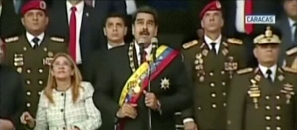 Momento de la explosión que interrumpió el discurso de Nicolás Maduro - Sputnik Mundo