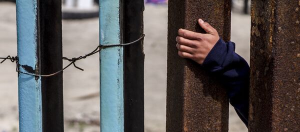 Migrante del lado estadounidense de la frontera con México - Sputnik Mundo