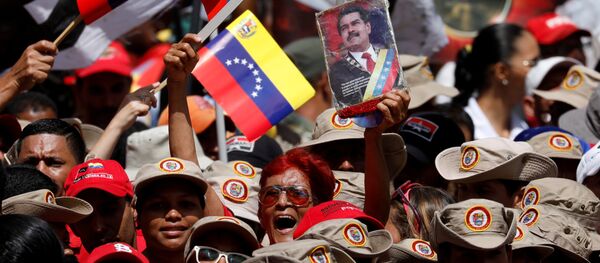 Los seguidores de Nicolás Maduro machan en apoyo al presidente - Sputnik Mundo