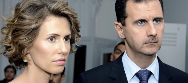 Asma Asad, primera dama siria, al lado de su marido, el presidente Bashar Asad Asma Asad, primera dama siria, al lado de su marido, el presidente Bashar Asad - Sputnik Mundo