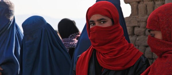 Unas mujeres en burkas - Sputnik Mundo