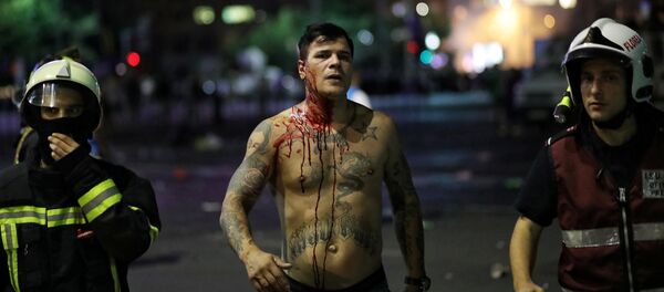 Un manifestante rumano - Sputnik Mundo