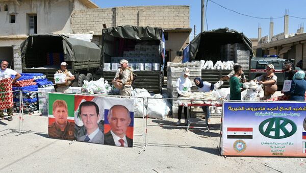 Punto de entrega de ayuda humanitaria de la Fundación Pública Local Ajmat Kadírov en Alepo - Sputnik Mundo