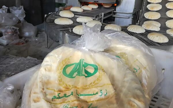 Rusia está con ustedes, se dice sobre el embalaje del pan - Sputnik Mundo