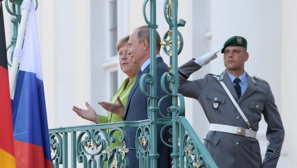 Angela Merkel y Vladímir Putin Angela Merkel y Vladímir Putin - Sputnik Mundo