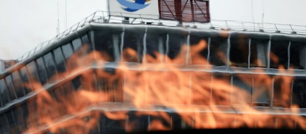 Un logo de la compañía francesa Total - Sputnik Mundo