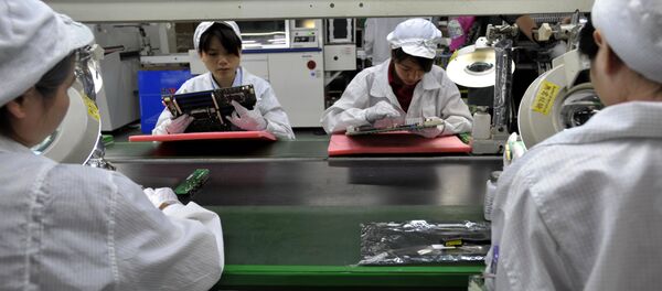 Una fábrica de ordenadores, foto de archivo - Sputnik Mundo