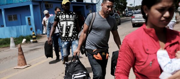 Migrantes venezolanos en la frontera de Brasil - Sputnik Mundo