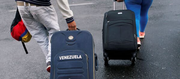 Migrantes venezolanos en Ecuador - Sputnik Mundo
