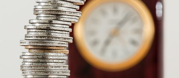 Monedas y un reloj - Sputnik Mundo