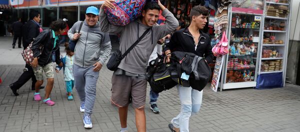 Los migrantes venezolanos en Perú - Sputnik Mundo