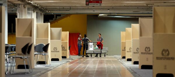 Puesto de votación de la Consulta Anticorrupción en Colombia - Sputnik Mundo
