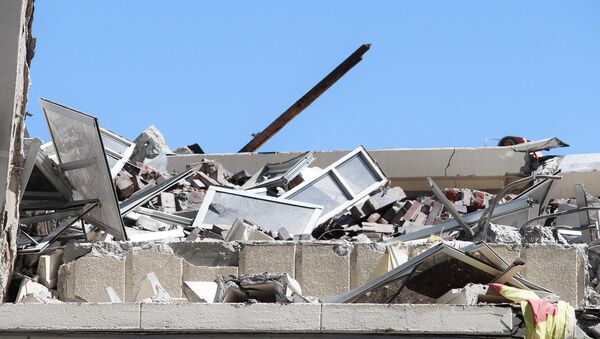 Demolición de una casa  - Sputnik Mundo