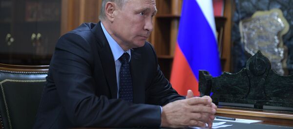 Vladímir Putin, presidente de Rusia durante su viaje de trabajo a Kémerovo - Sputnik Mundo