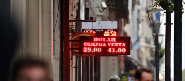 Carteles con la cotización del dólar en Buenos Aires - Sputnik Mundo