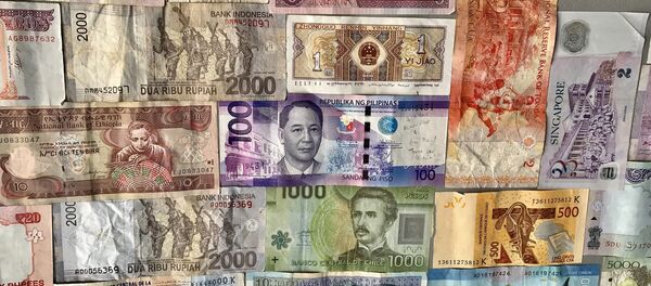 Billetes de diferentes países - Sputnik Mundo