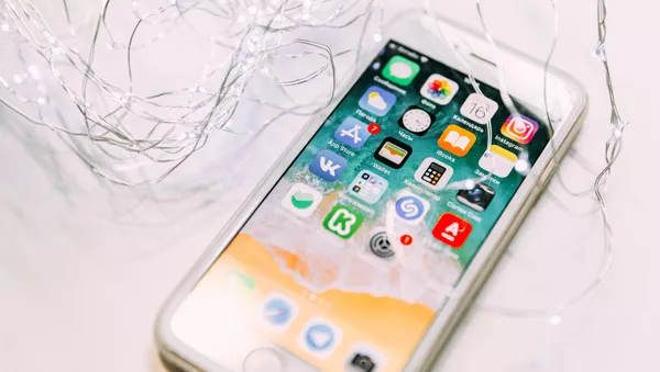 Un iPhone, imagen referencial - Sputnik Mundo