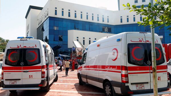 Ambulancias cerca de la petrolera libia NOC en Trípoli - Sputnik Mundo