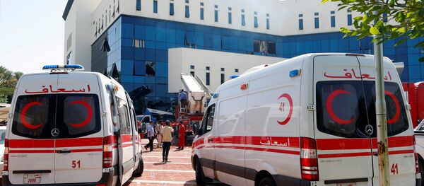 Ambulancias cerca de la petrolera libia NOC en Trípoli - Sputnik Mundo