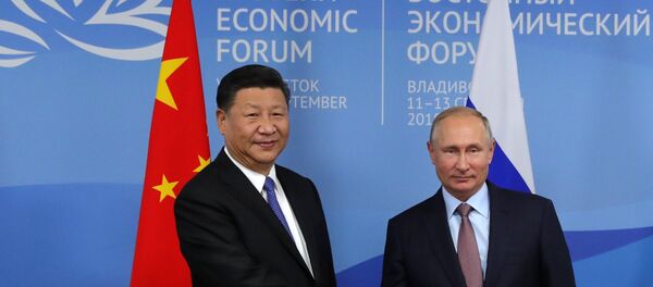 El presidente de China, Xi Jinping, y presidente de Rusia, Vladímir Putin - Sputnik Mundo