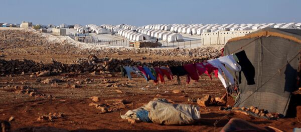 Un campo de refugiados en Siria - Sputnik Mundo