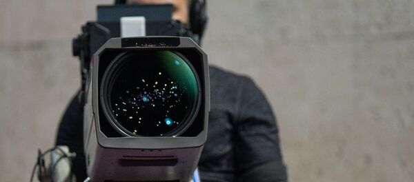 Un operador con una cámara, referencial - Sputnik Mundo