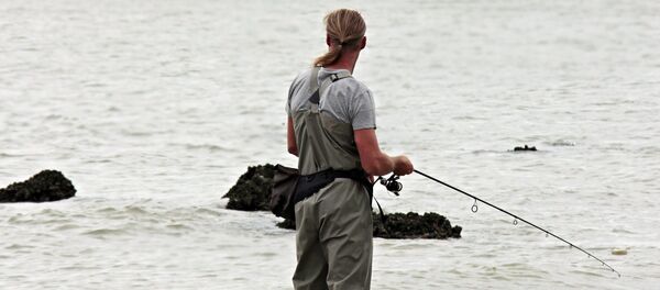 Un pescador y el mar (imagen referencial) - Sputnik Mundo