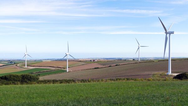 Unos molinos de viento (imagen referencial) - Sputnik Mundo