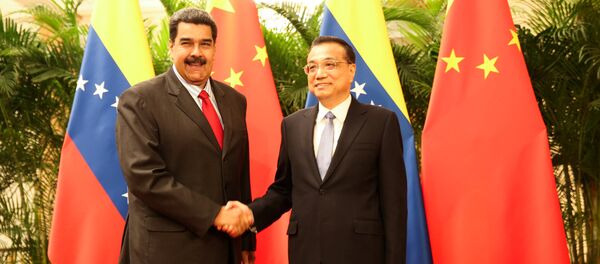 El presidente de Venezuela, Nicolás Maduro, y el primer ministro chino, Li Keqiang en Beijing, China - Sputnik Mundo