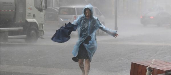 Las consecuencias del supertifón Mangkhut en la ciudad china de Shenzhen Las consecuencias del supertifón Mangkhut en la ciudad china de Shenzhen - Sputnik Mundo