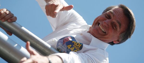 El candidato presidencial brasileño de ultraderecha Jair Bolsonaro El candidato presidencial brasileño de ultraderecha Jair Bolsonaro - Sputnik Mundo