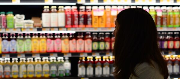 Mujer en un supermercado - Sputnik Mundo