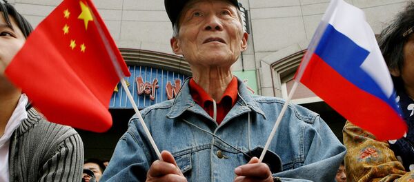 Banderas de Rusia y China - Sputnik Mundo