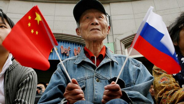 Banderas de Rusia y China - Sputnik Mundo