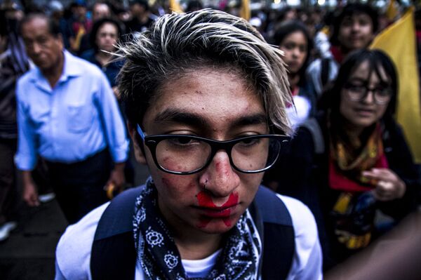 Estudiante de la UNAM durante la Marcha del Silencio 2018 en la Ciudad de México - Sputnik Mundo