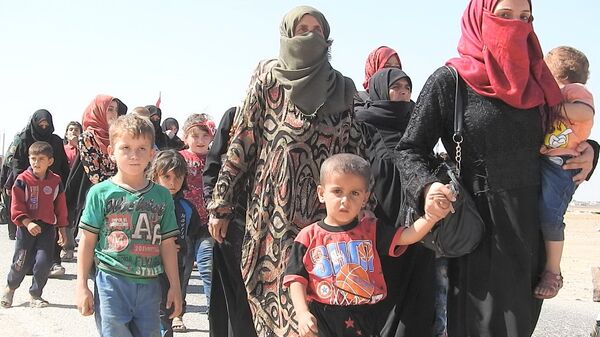 Civiles sirios en Abu al Duhur - Sputnik Mundo