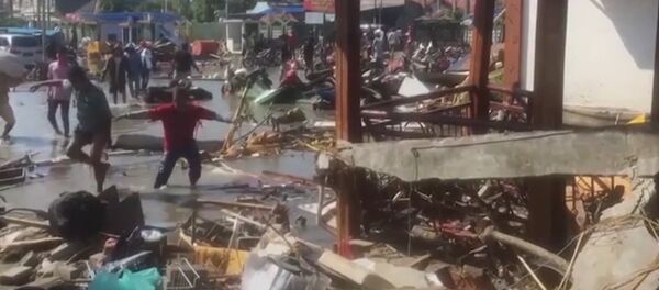 Indonesia, arrasada por un tsunami mortal - Sputnik Mundo