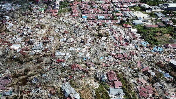 Consecuencias de Tsunami en Indonesia - Sputnik Mundo