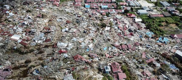 Consecuencias de Tsunami en Indonesia - Sputnik Mundo