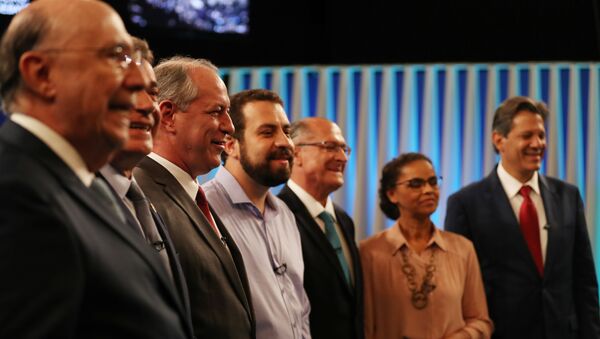 Candidatos durante el debate electoral en Brasil - Sputnik Mundo