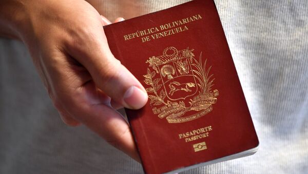 Un pasaporte venezolano - Sputnik Mundo