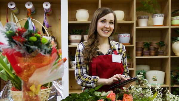 Una mujer que ama las flores... porque es una florista - Sputnik Mundo