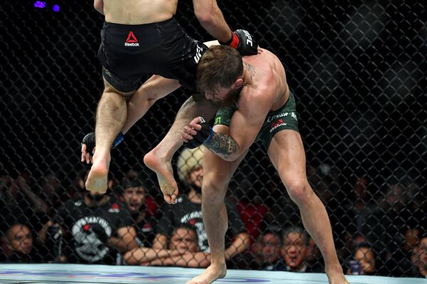 Las mejores imágenes del combate entre MCGregor y Khabib - Sputnik Mundo