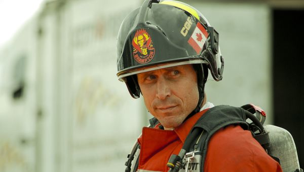 Un bombero canadiense Un bombero canadiense - Sputnik Mundo