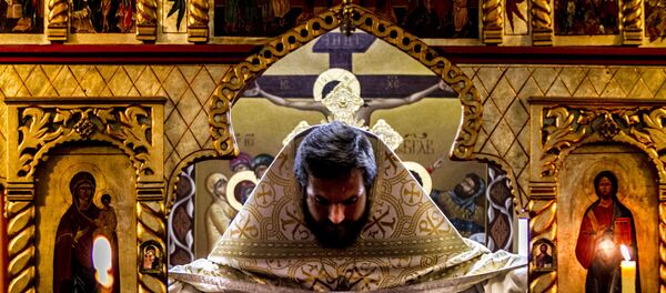 Padre Stahiy, de Moscú, en la Iglesia ortodoxa Rusa en Ciudad de México durante uno de los oficios religiosos en la colonia Cuauhtémoc - Sputnik Mundo